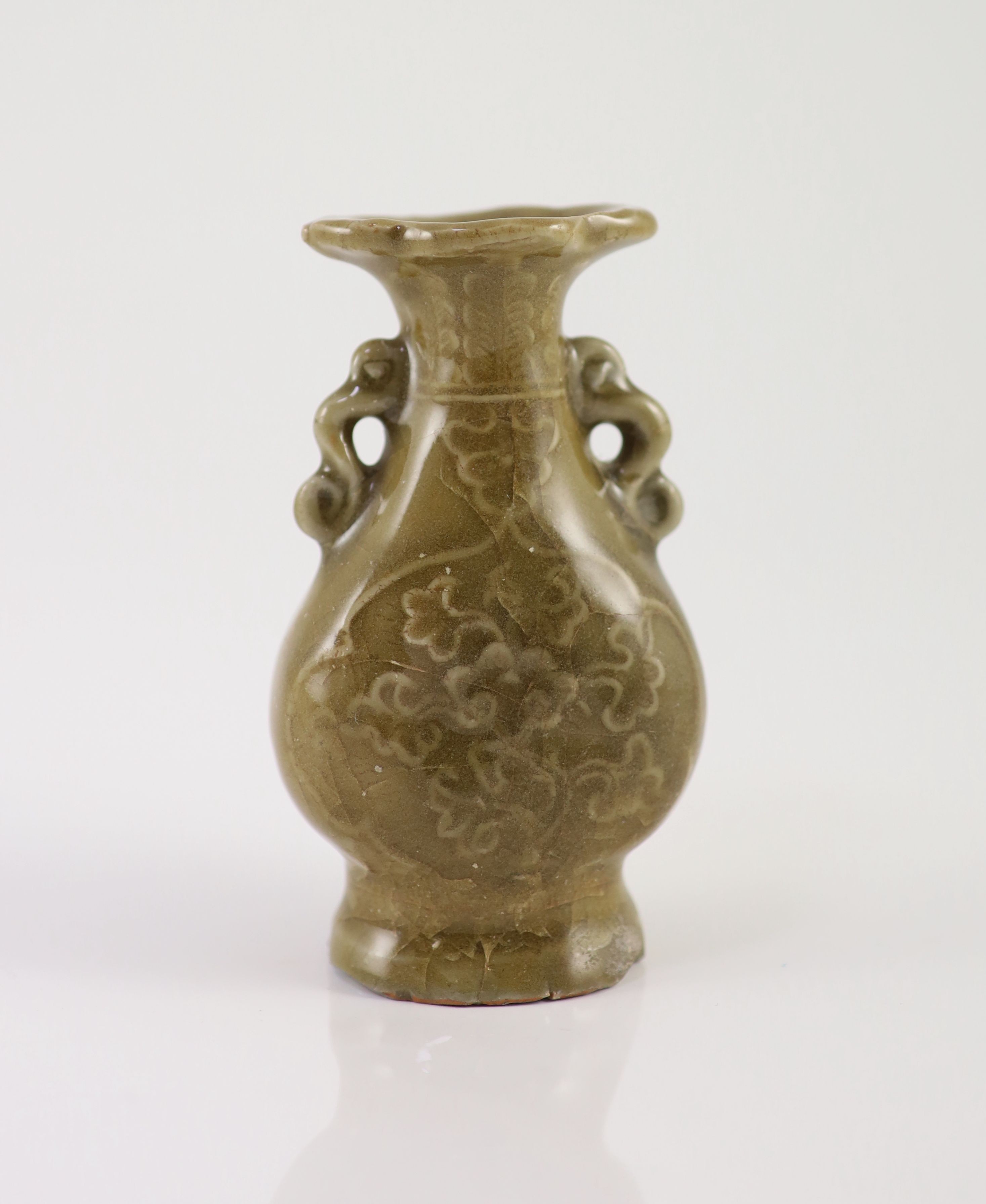 A small Chinese Longquan celadon two handled vase, Ming dynasty, 15th century, 11.5cm high